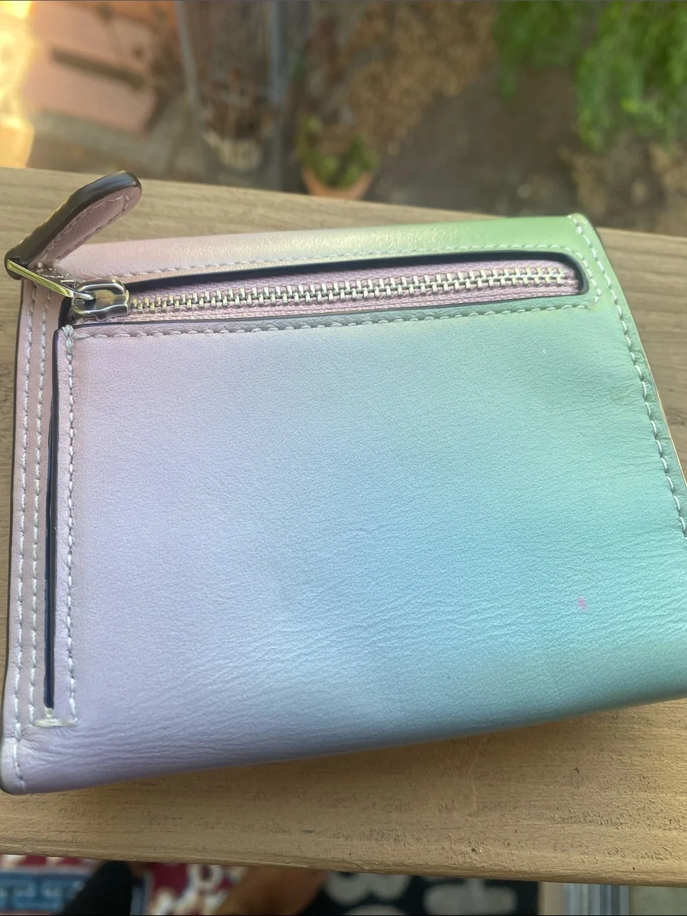 Coach compact pebbled